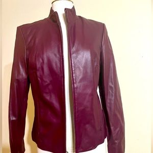 Gorgeous 100% leather plum/cranberry leather jacket from Saks, NWT